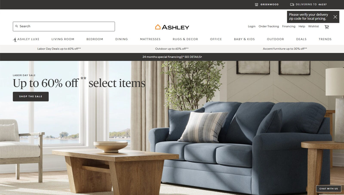 Ashley Furniture website homepage showing furniture collections