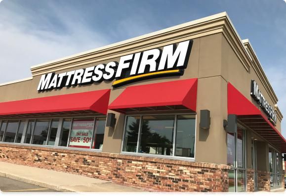 Mattress Firm retail showroom exterior with red brand signage