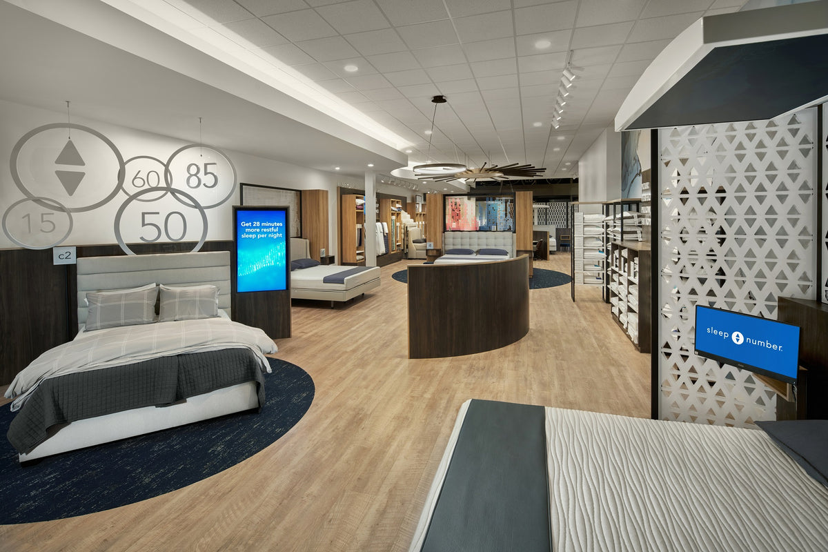 Sleep Number retail showroom boutique with illuminated signage