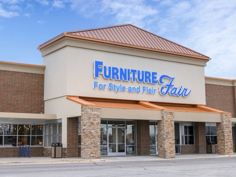 Furniture Fair Greenwood Indiana store exterior with covered stone-pillared entrance and brick facade