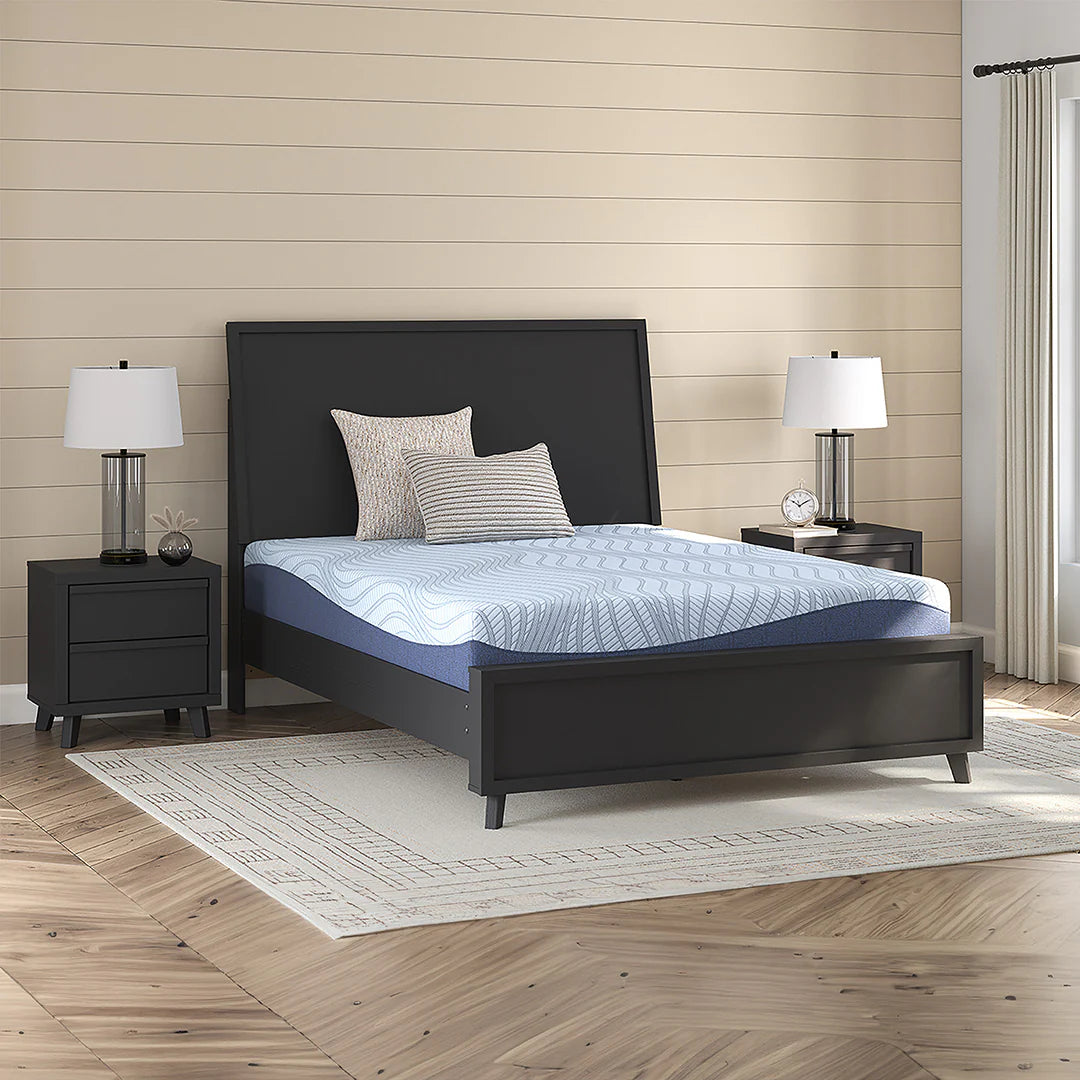 Memory foam mattress in a styled bedroom with the full bed frame and nightstands visible