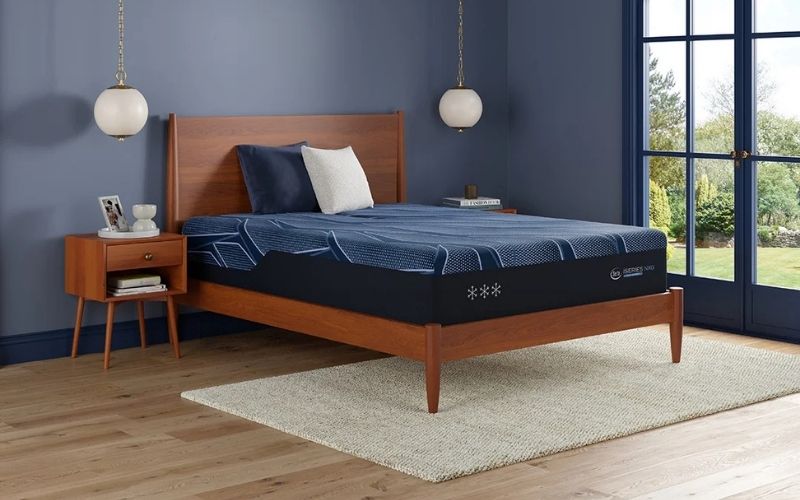 Serta iSeries NXG 3500 Hybrid firm mattress displayed in a bright bedroom setting at Furniture Fair