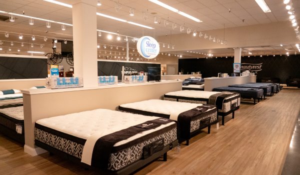 Furniture Fair Sleep Center showroom with mattress and bed displays