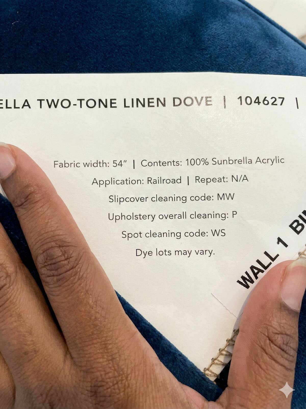 Manufacturer upholstery fabric sample card showing care information and Spot Cleaning Code WS