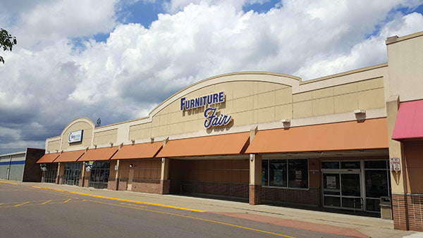 Furniture Fair Western Hills store exterior with orange awning and parking lot