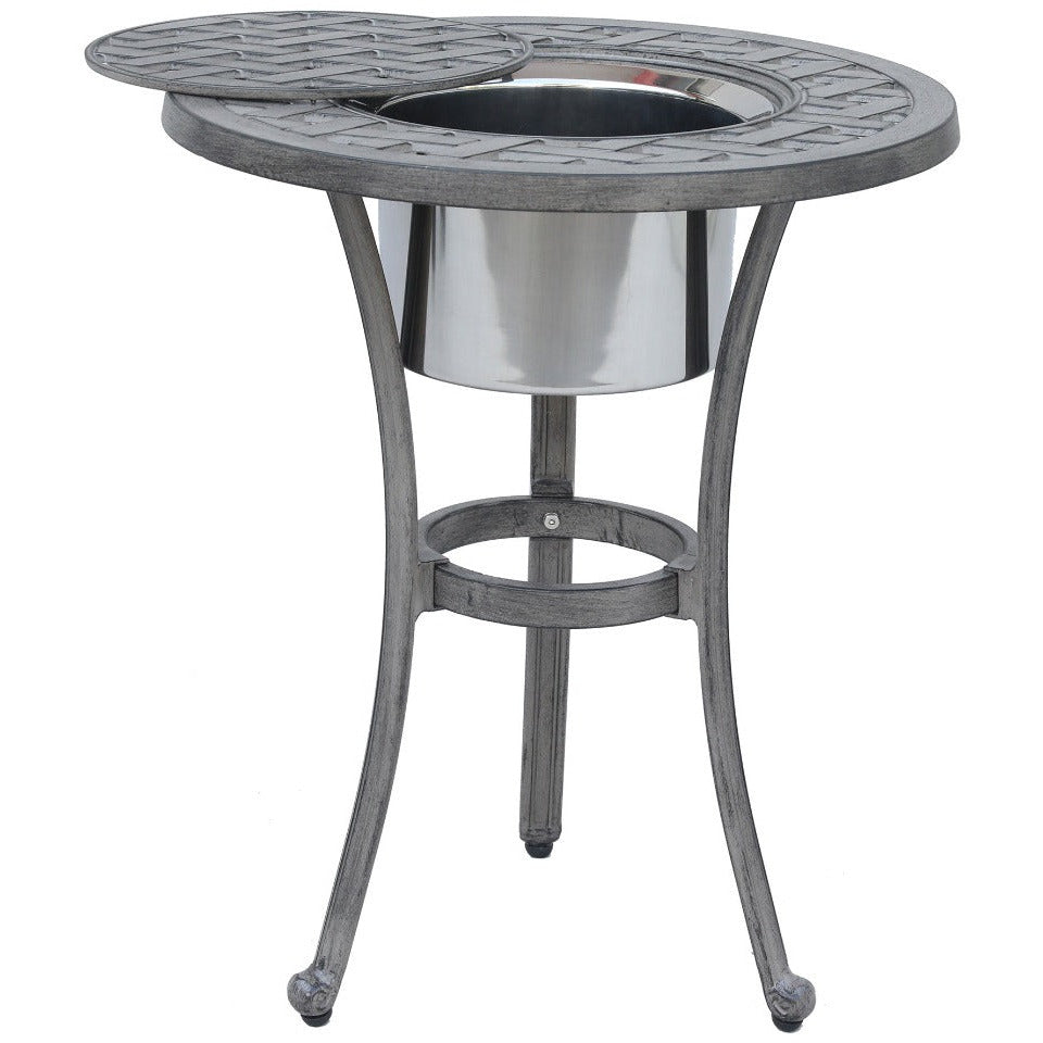 An outdoor accent table by Gathercraft, featuring a stainless steel ice bucket. The table is made of durable aluminum and has a neutral color palette. The ice bucket keeps beverages cool, while the lightweight construction allows for easy relocation. Enhance your outdoor entertaining experiences.