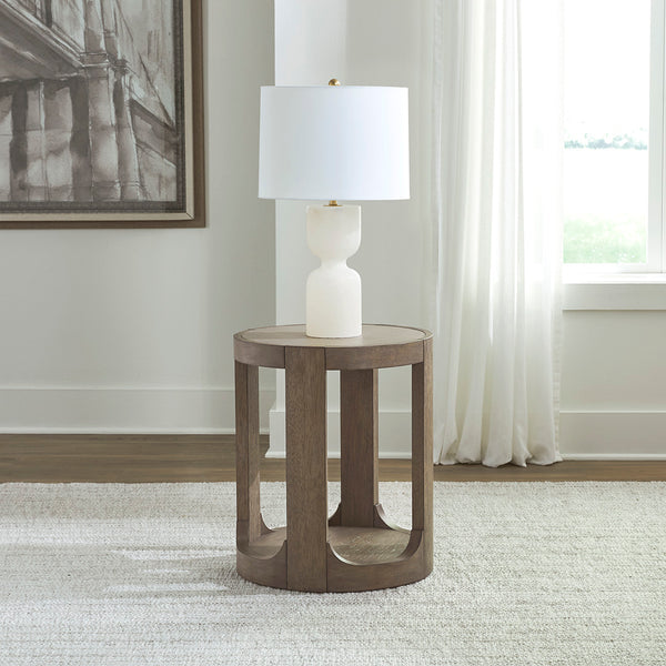 South Bend Round Side Table from Liberty Furniture in Brown - Side view