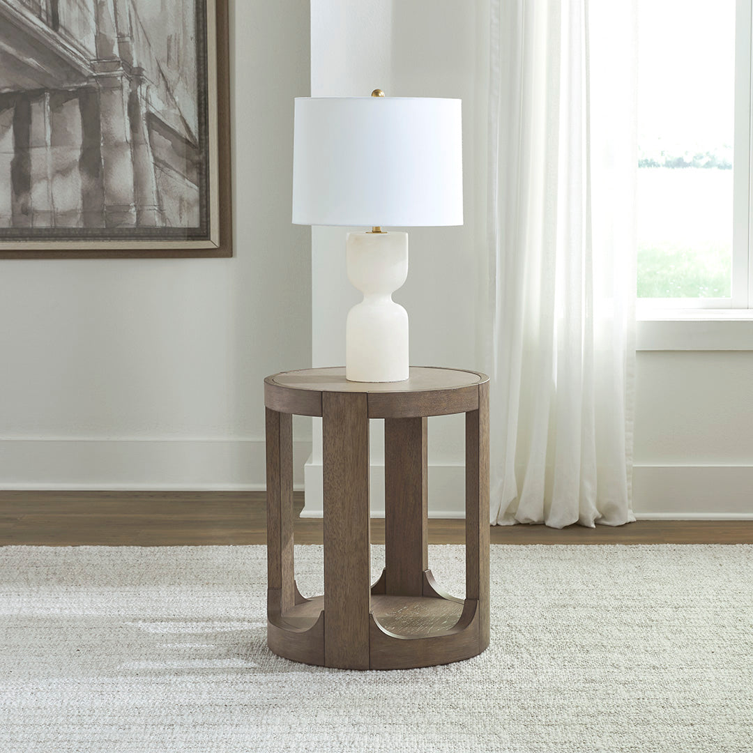 South Bend Round Side Table from Liberty Furniture in Brown - Side view
