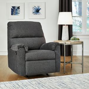 Miravel Manual Recliner by Ashley Furniture - A luxurious recliner in strong gunmetal upholstery with sleek design and ultimate comfort. Adjustable reclining positions for personalized relaxation. Enhance your space with this stylish and inviting recliner. Perfect for leisurely activities or unwinding after a long day.